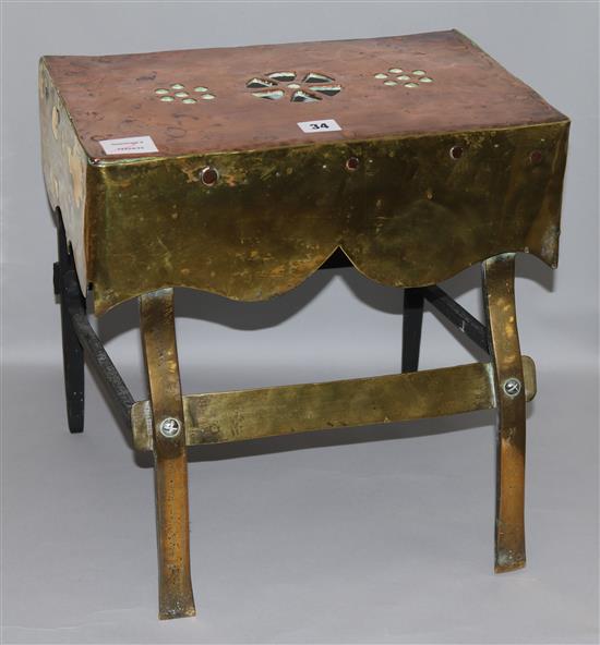 An early Victorian copper and brass footman